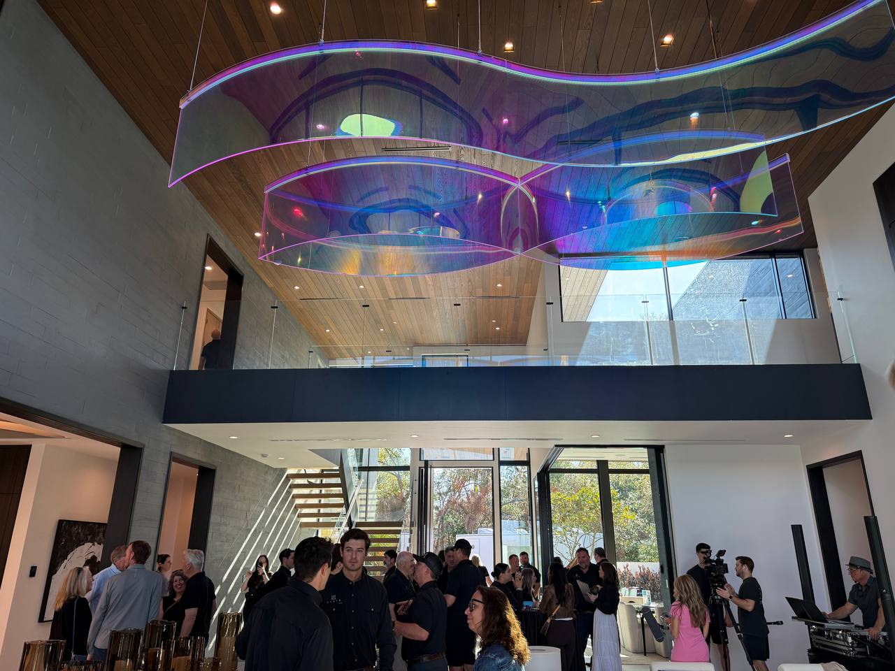 IBS 2026 โ crowd event with sculpture overhead